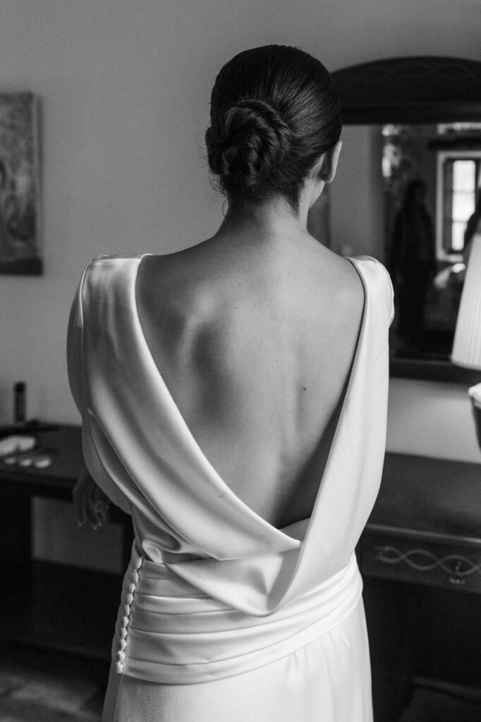 Boho bride laughing while getting ready in Mallorca