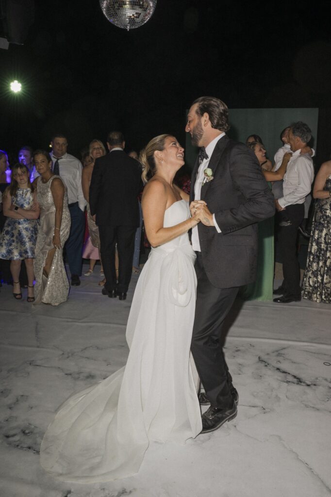 Candid photo of bride and groom dancing at Mallorca destination wedding