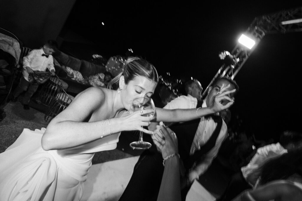 Luxury wedding party at Sa Torre de Porreres, Mallorca with guests dancing under fairy lights